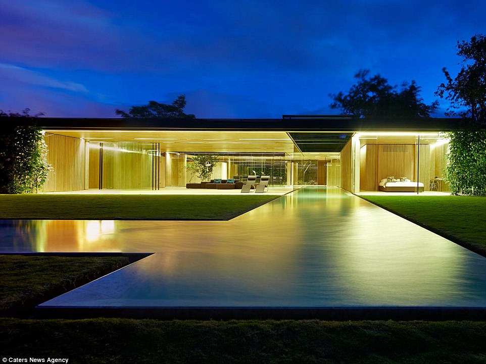 The Wood House in Costa Rica covers 1,320 square meters of lot and 651 square meters of construction