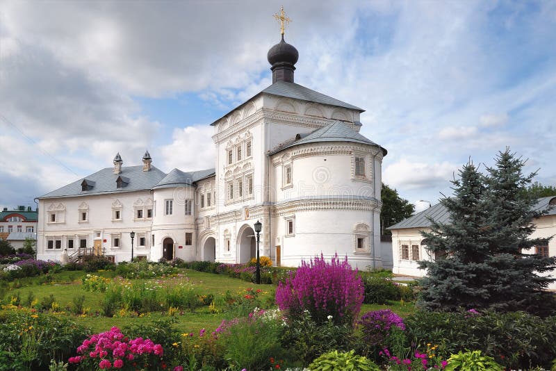 Assumption Cathedral of the Blessed Virgin Mary in the city of Kirov. Flower beds are spread among the temple silence on a summer stock images