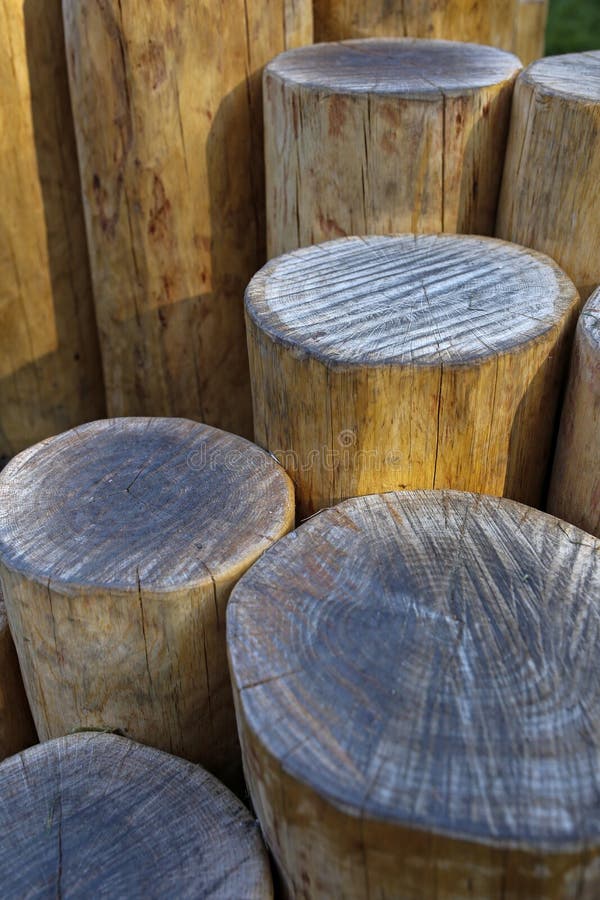 Decorative wooden logs fence stock photography
