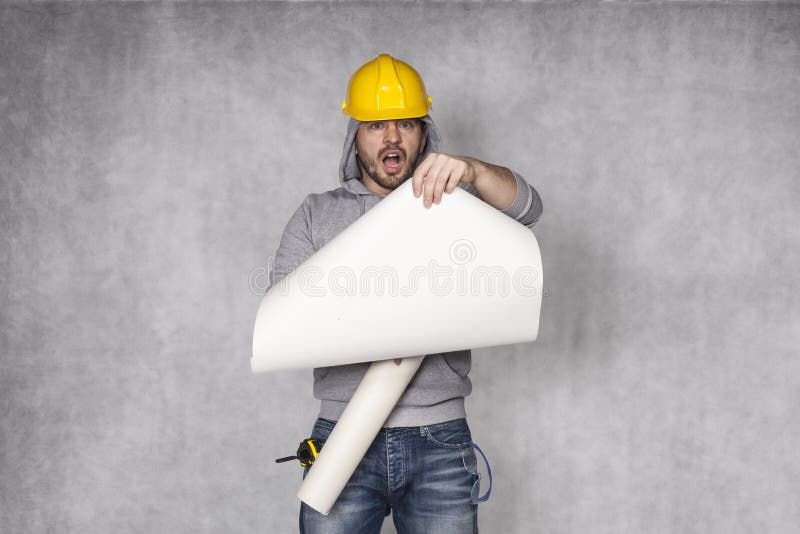Constructor has trouble with the plans royalty free stock images