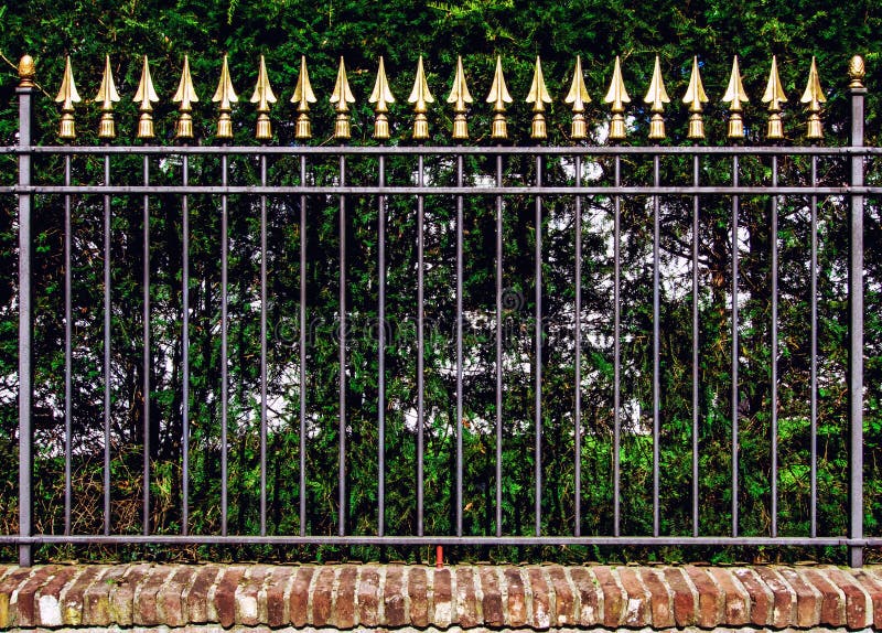 Decorative iron fence stock photography
