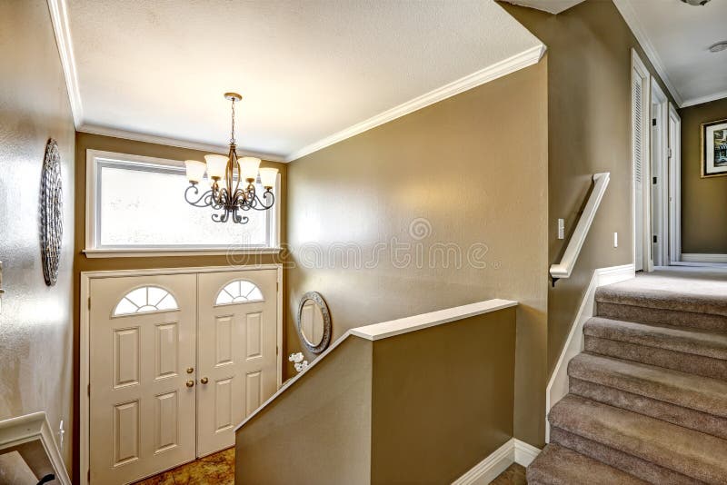 Entrance hallway with staircase stock image