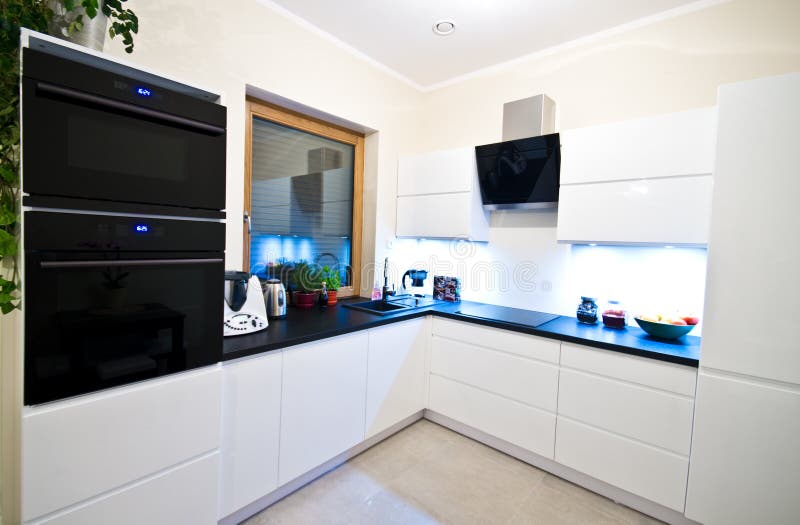 Modern kitchen in white stock photos