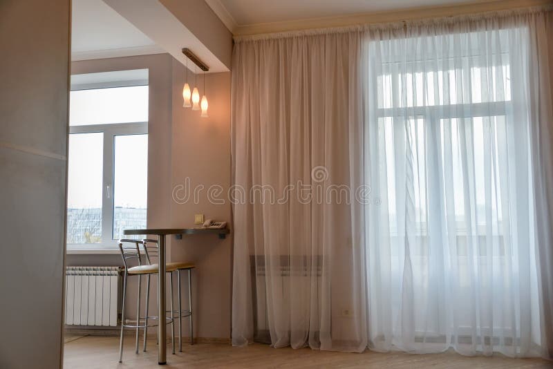 Modern, simple interior in light apartments. Modern, simple interior design in light apartments royalty free stock photos