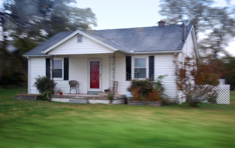 Small country home. Small country home in historic Nashville. Motion blur on house, porch in focus royalty free stock images