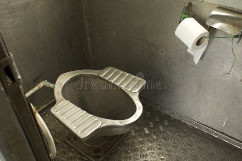 Train toilet. Stainless local made toilet ware in Thailand train bogie bathroom stock image