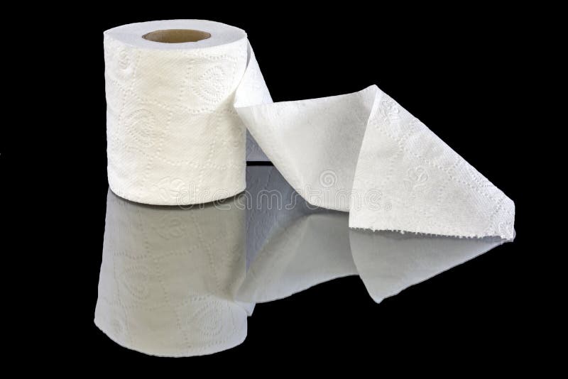 White patterned toilet paper in a roll. Roll of toilet paper ready for use stock images
