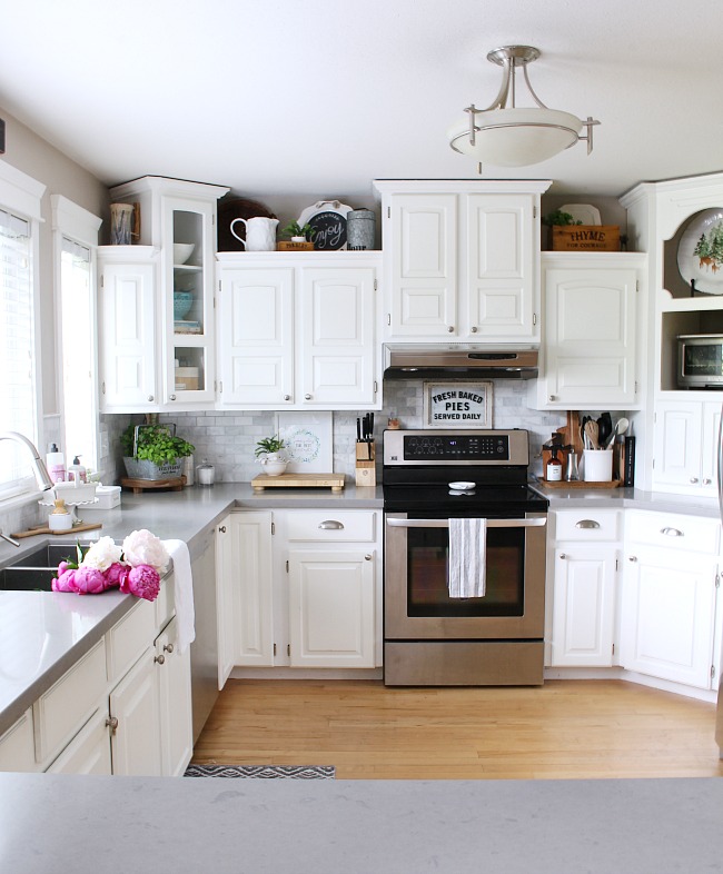 Summer Kitchen Decorating Ideas. White farmhouse style kitchen decorated for summer.